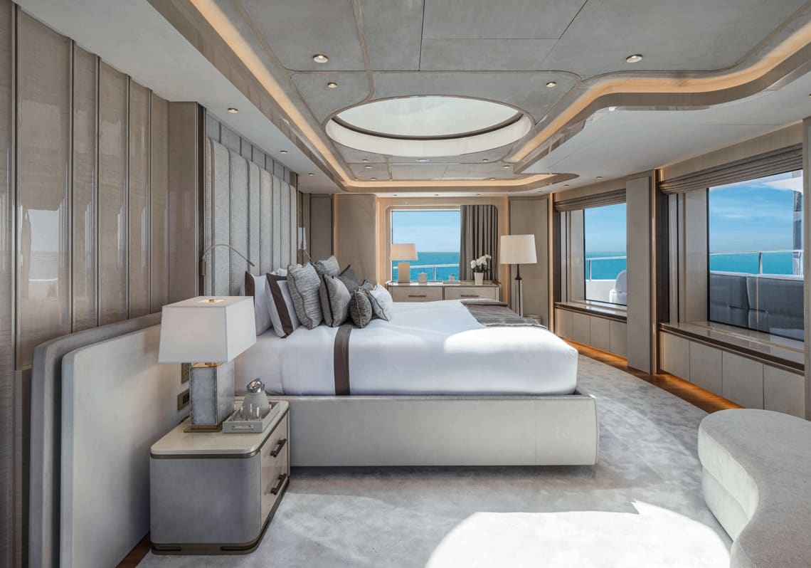 Modern Bedroom on a Yacht with a Queen Bed and Many Windows