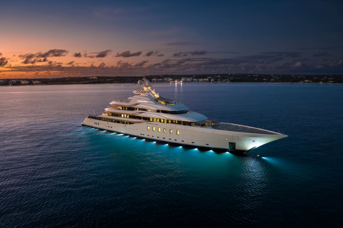 Yacht with Lights on the water at night