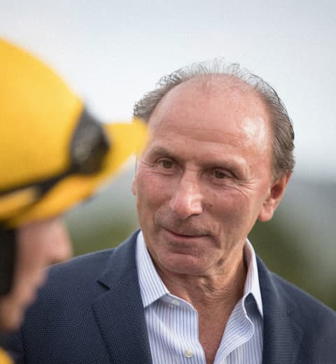 Company Founder and President Robert Moran at horse race