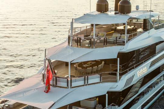 The top decks of a large yacht
