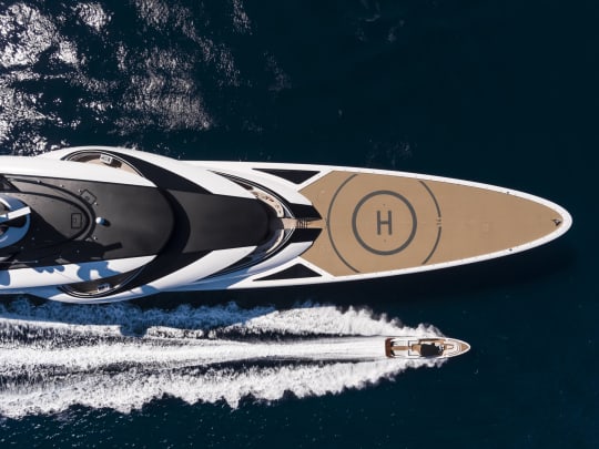 Top View of Yacht next to a boat on the water